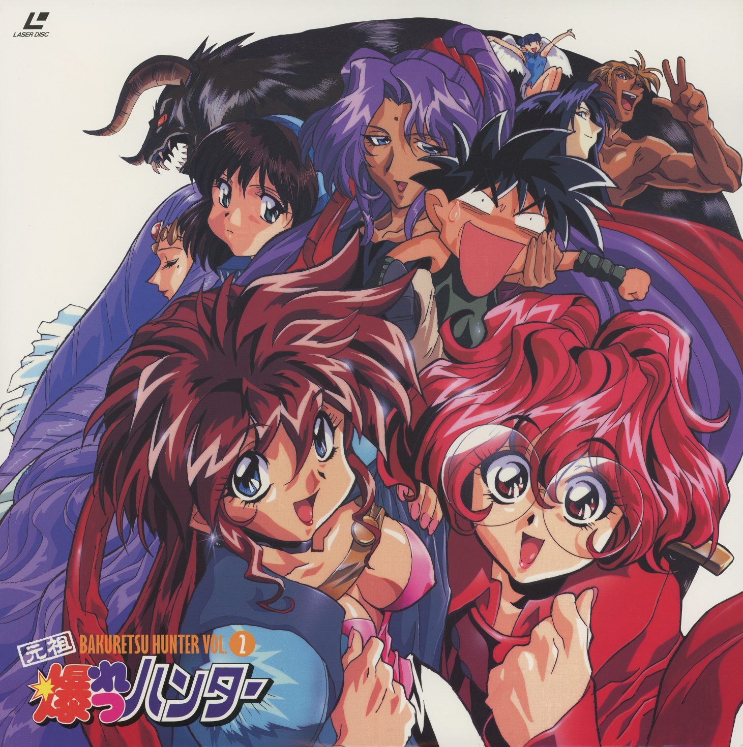 Vol.2 jacket front — KILA-309. Tira and Chocolate in their default personalities: smaller-proportioned, open, smiling. The full supporting cast around them. The jacket series shows both halves of the gimmick.