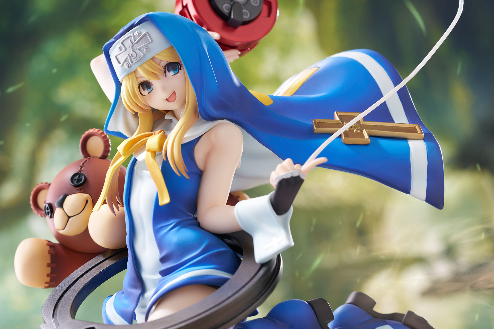 Dynamic angle — cape sweep and yo-yo wire forming a visual frame around the figure.