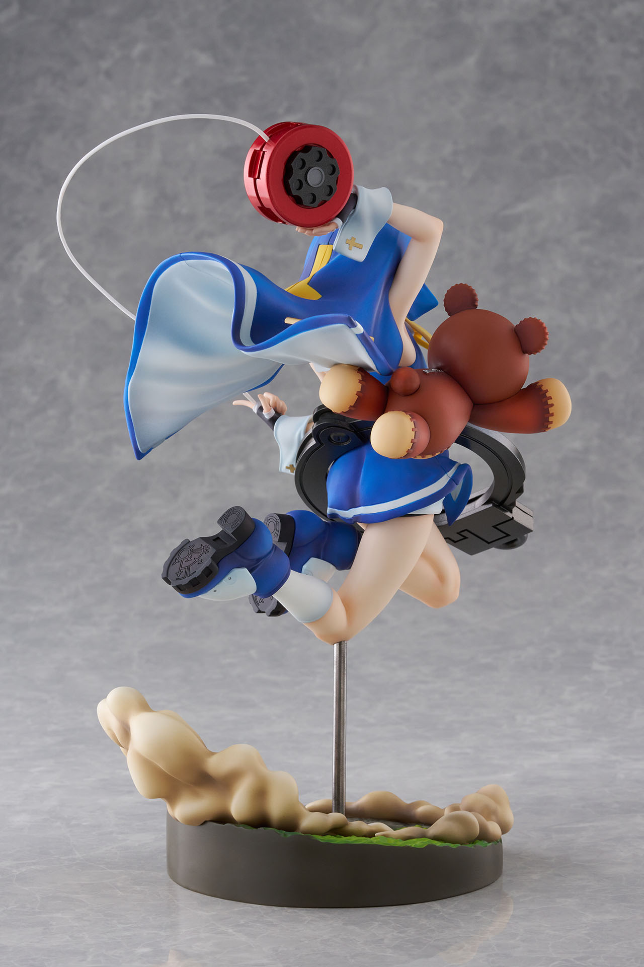 Rear view — Roger's full body visible, arm seams and patched belly. Cape interior lighter blue with white stripe.