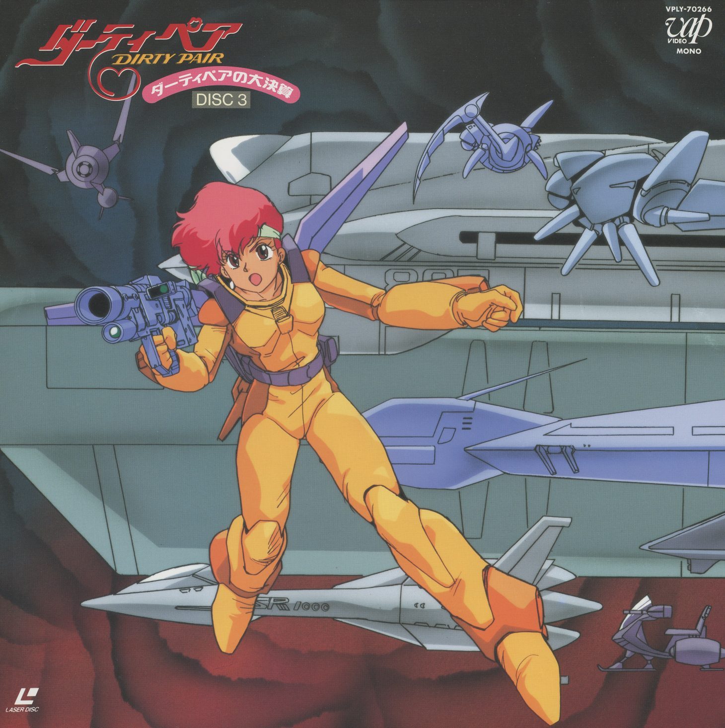 Disc 3 jacket — Kei in orange-yellow full bodysuit, handgun raised, surrounded by blue spacecraft and missile hardware. TV episodes 9–12. The combat register.