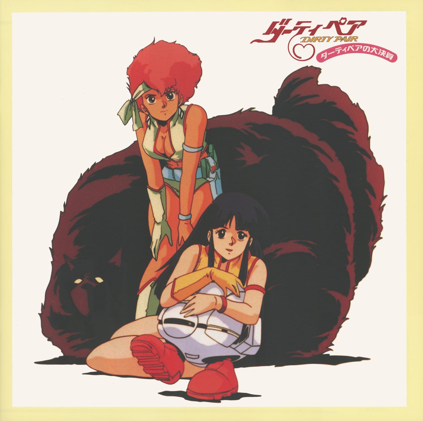 Mughi photo card — a small square bonus card showing Kei and Yuri with the large black Mughi, sitting against a plain background. Printed as a photograph rather than illustration. ダーティペアの大決算 title in the upper corner.