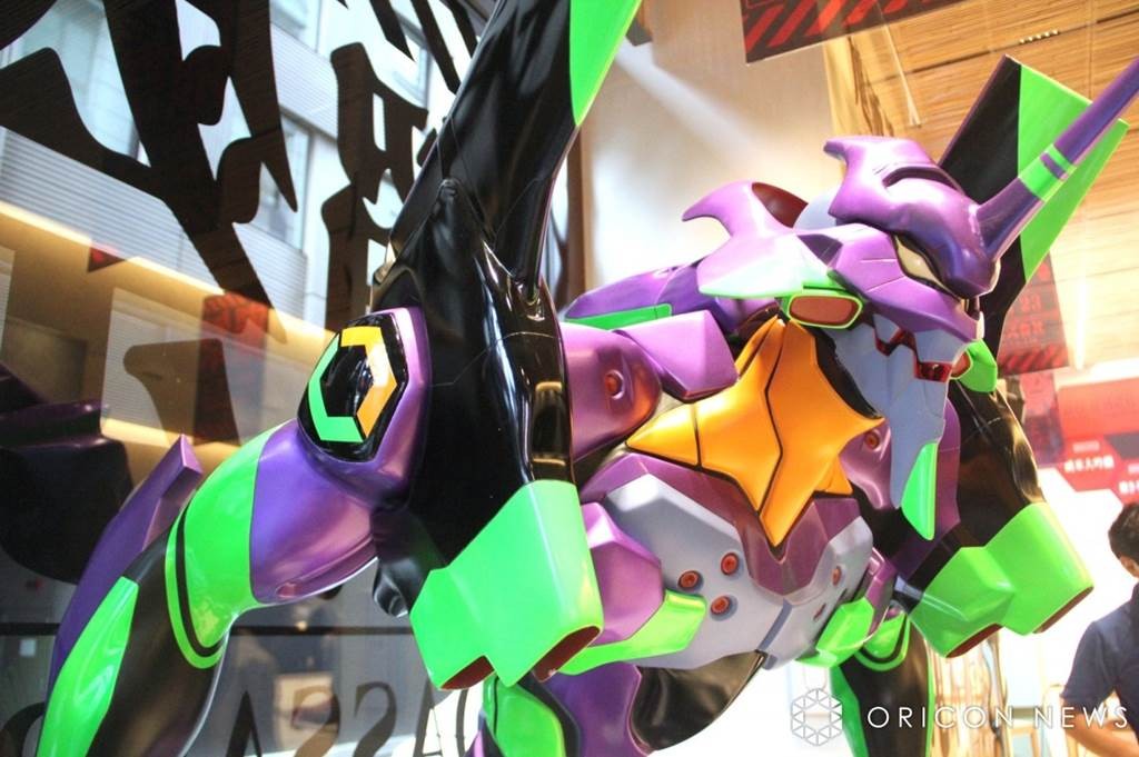 Unit-01 statue &mdash; life-sized bust at the ALL OF EVANGELION exhibition (Roppongi Hills, through January 2026), the touring precursor to the Yokohama festival