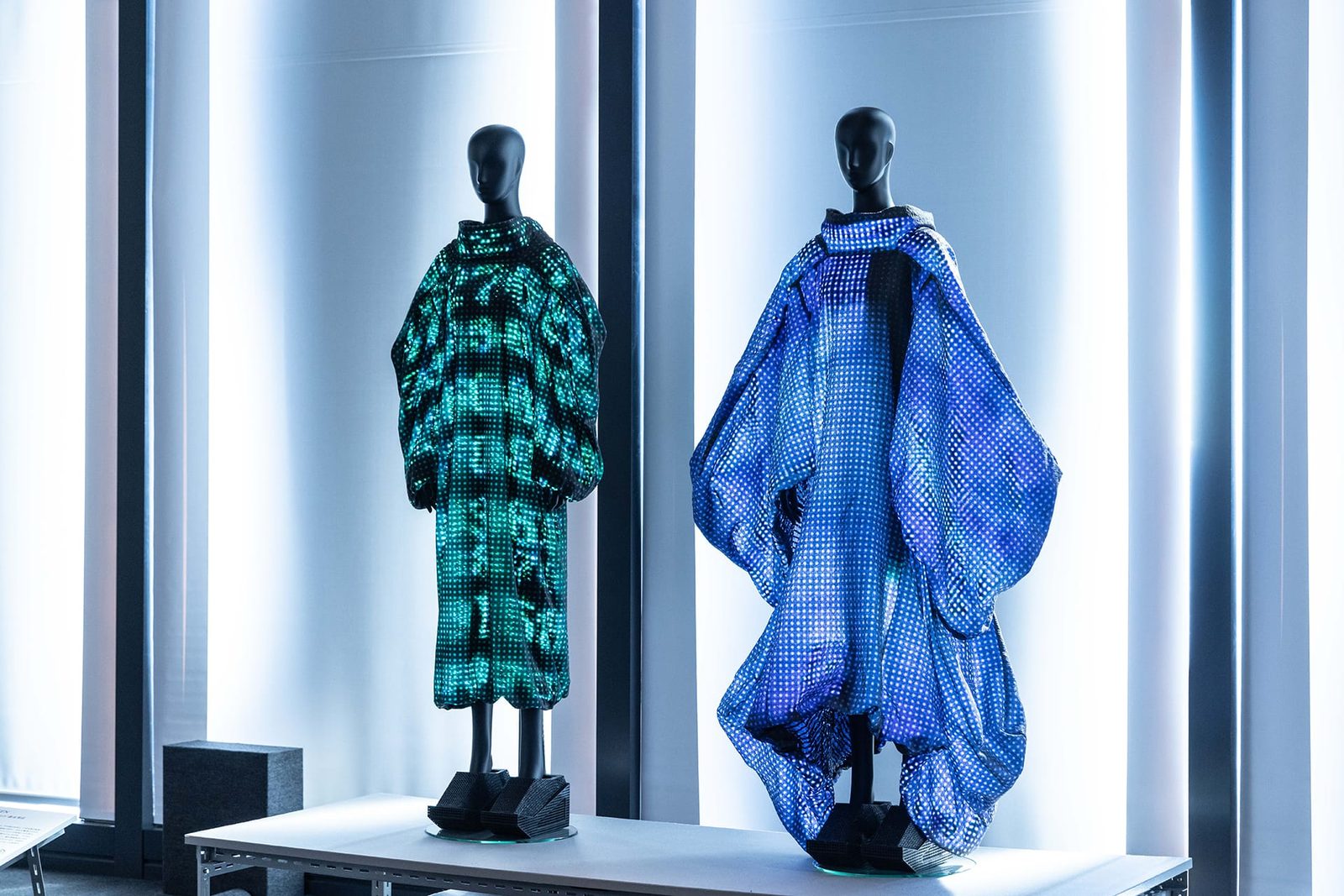 ANREALAGE's thermochromic camouflage wearables on display — fashion collaboration that translates Major Kusanagi's optical camouflage into wearable temperature-reactive fabrics