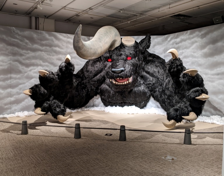Nosferatu Zodd in apostle form &mdash; life-sized installation of the colossal furred beast emerging from clouds, one of the exhibition's most imposing pieces