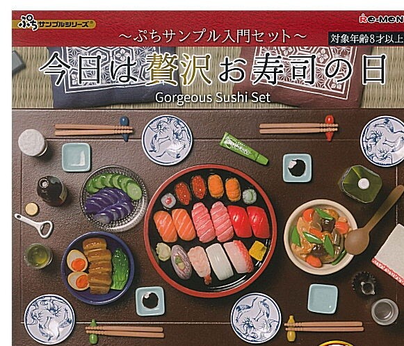 Japanese miniature food gashapon — ramen, sushi, bento boxes at 1/12 scale. The paint detail on the nori and the gloss on the broth are intentional. This is craft