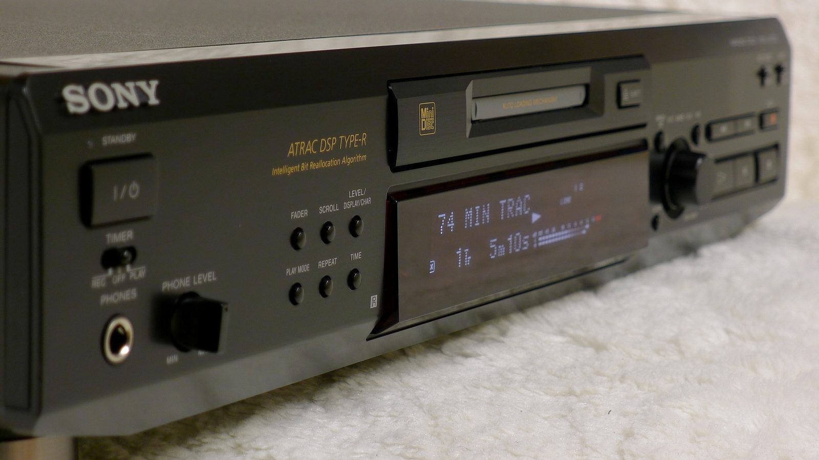 Sony MDS component deck with ATRAC DSP TYPE-R — the home recording backbone. Timer recording from radio, track splitting, disc labelling. The format served an existing habit