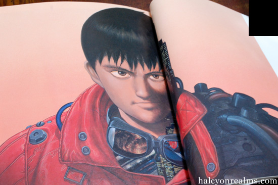 Original AKIRA manuscript pages behind glass — the exhibition revealed details invisible in print, including where ink pooled at panel edges and where white-out was applied